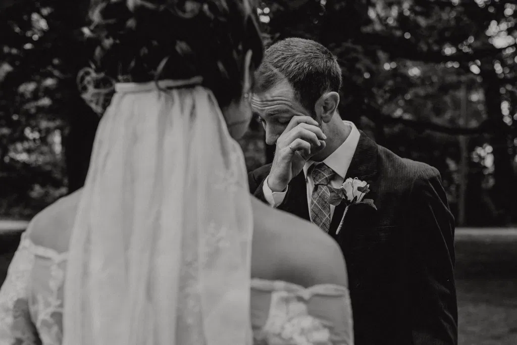 Groom tears up seeing bride during wedding first look