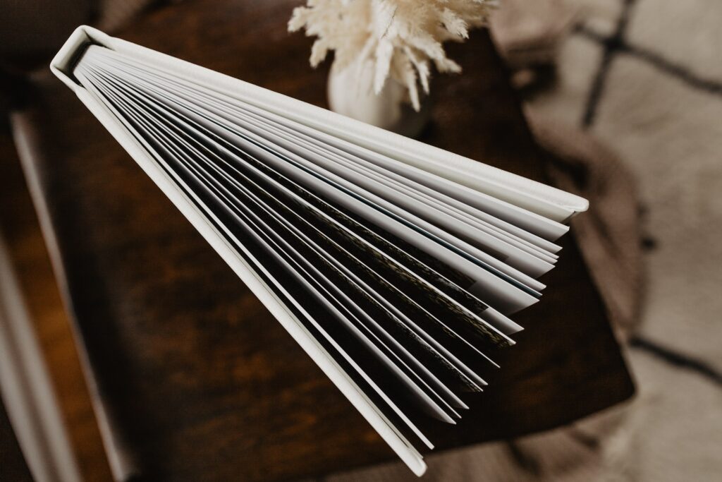 Keepsake wedding album in white from a top down view to see the pages