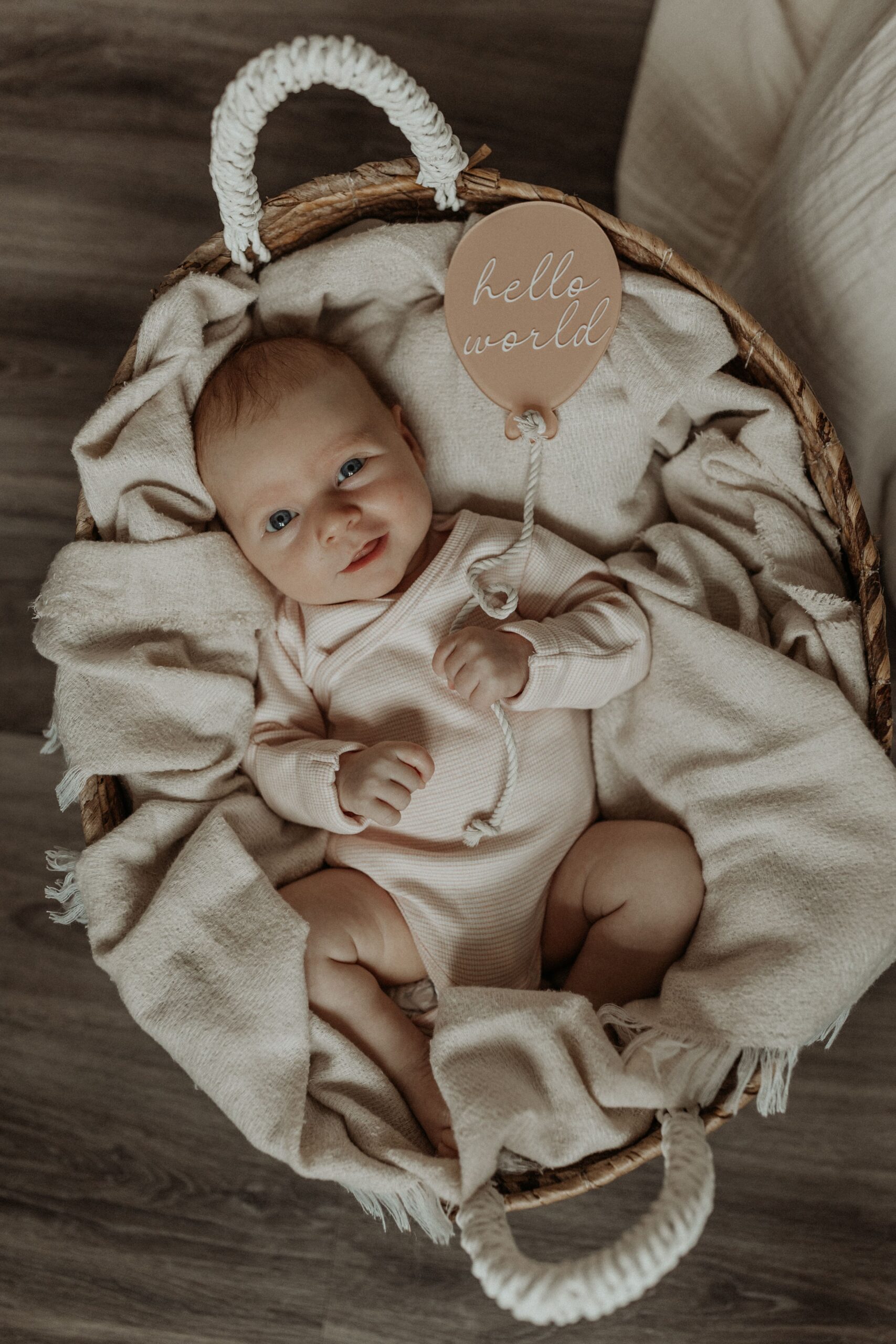 Newborn photo of a baby in a basket