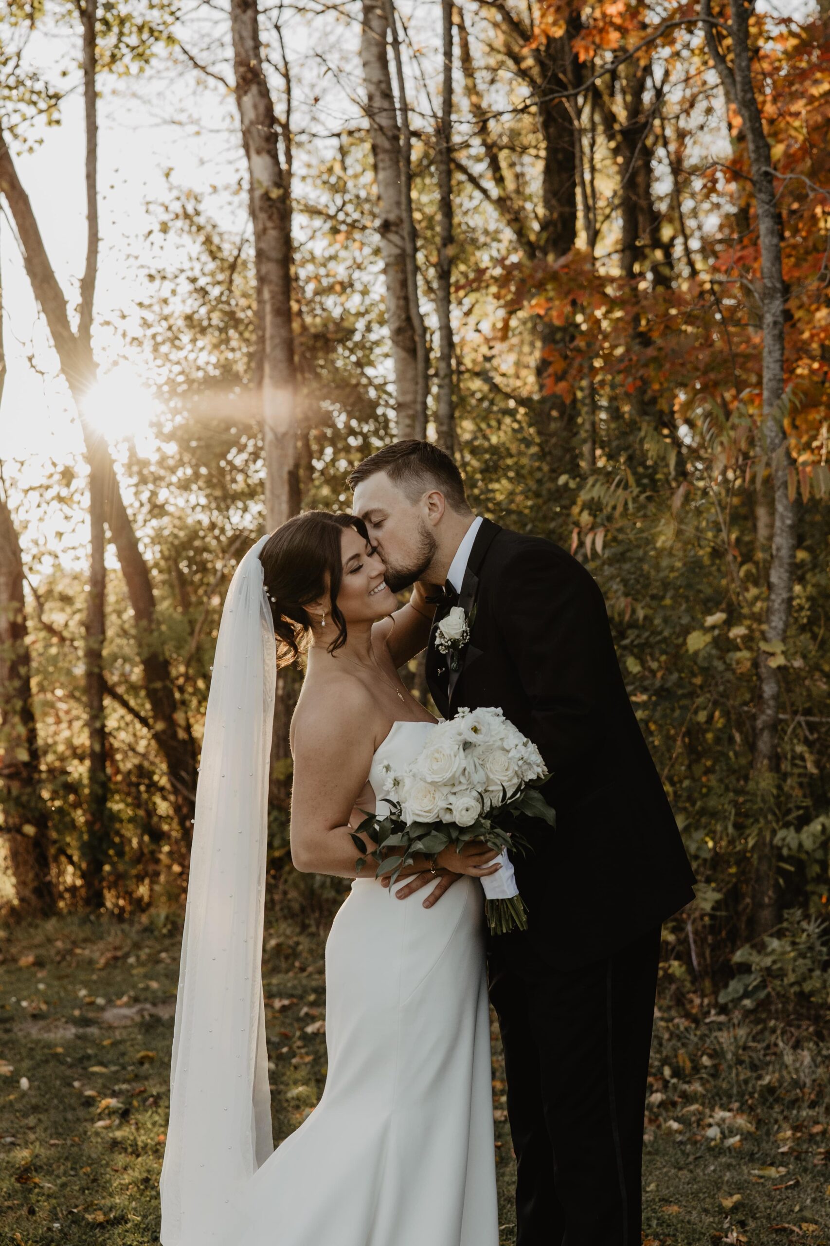 Bride and groom kissing on their wedding day at sunset at the Annex WNY photographed by Buffalo Wedding Photographer Jessy Herman Photo